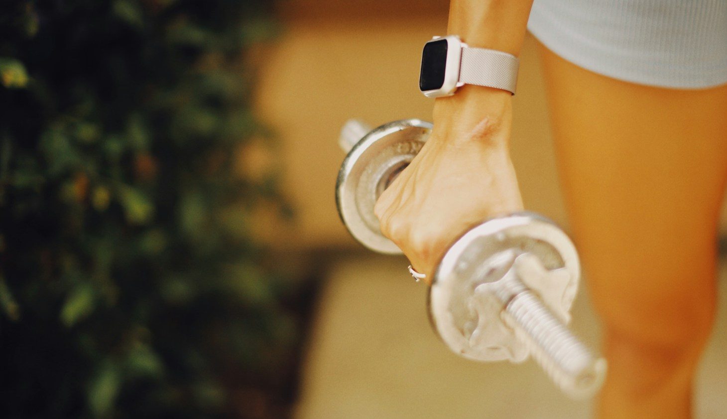 a close up of a person holding a water bottle