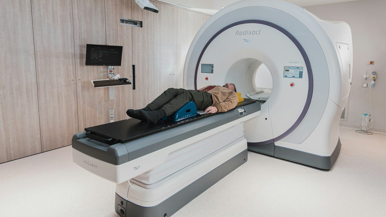 a person lying on a bed